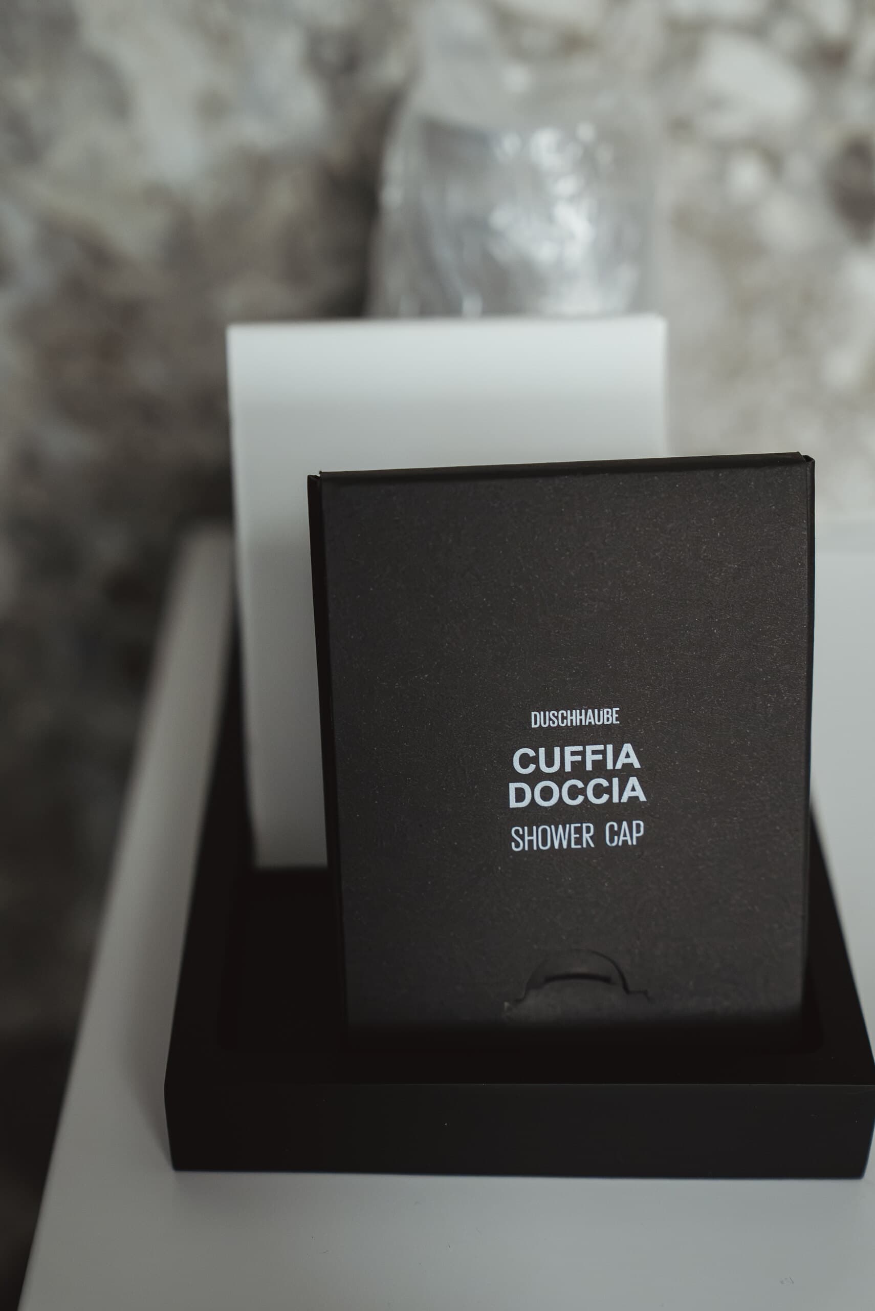Cuffia doccia del set di cortesia